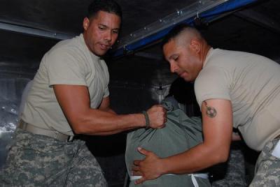 closing-guantanamo-bay1_large Photo: Puerto Rico National Guard troops pack it in after a year's deployment at Guantanamo; The National Guard; licensed under creative commons